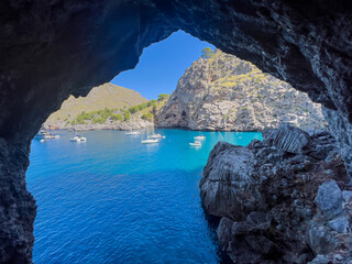 Sa Calobra is a stunning setting for two unique beaches of Majorca tucked in among steep rocky...