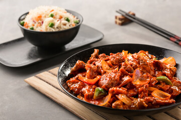 Beef Mongolian with Vegetable Fried Rice and chopsticks served in dish isolated on background top view of chinese food