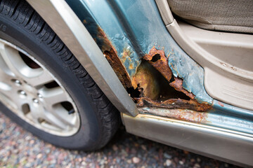 Rusty wheel arch of a car