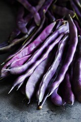 Long purple beans which turn green after cooking, fresh and healthy vegetables - 649756735