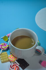 Copy space template with candy, chocolate and lollipop elements