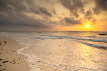Paradise beach with white sand and palms. Diani Beach at Indian ocean surroundings of Mombasa, Kenya. Landscape photo exotic beach in Africa