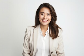 Cheerful adult woman with attractive smile and long hair in studio portrait