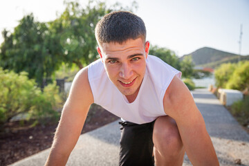 Portrait of a young athlete who is training outdoors