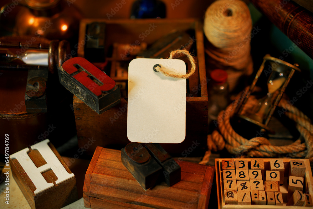 Fototapete paper label beside retro type objects and old wooden typographic blocks. letters and numbers. vinata