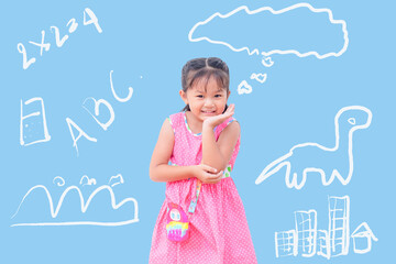 A girl with a bright smile and imagination all around her.