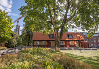 Old mansion red wood house, Stenbrottet and modern building apartments tower buildings Norr Tornen,...