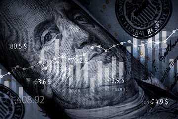 Closeup Benjamin Franklin face on USD banknote with stock market chart graph for currency exchange and global trade forex concept. - obrazy, fototapety, plakaty