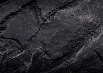 Foto op Canvas A mysterious dark natural stone texture background with a subtle, textured surface. © nannan