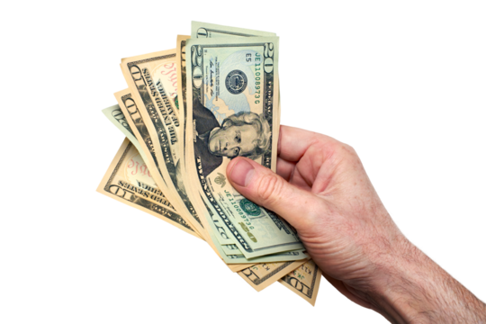 A hand holding, giving or paying American dollars in 10 and 20 banknotes, paper currency, isolated against a transparent background.