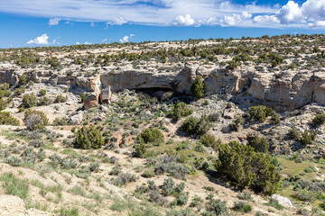 Arid rocky desert landscape with a cave in the wilderness of western Colorado.