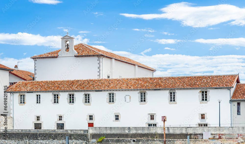 Wall mural Exterior facade of the Couvent des Recollets convent in Ciboure, France 