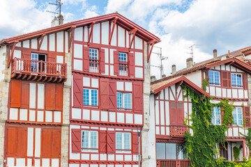 Typical red and white basque houses in Ciboure, France 