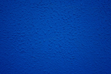 Vibrant Blue color on cement Textured Background