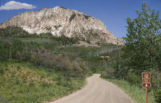  Colorado Backroad:  A gravel road through Kebler Pass approaches Crested Butte, CO from the west.
