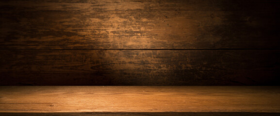 Wooden table with dark blurred background. High quality photo