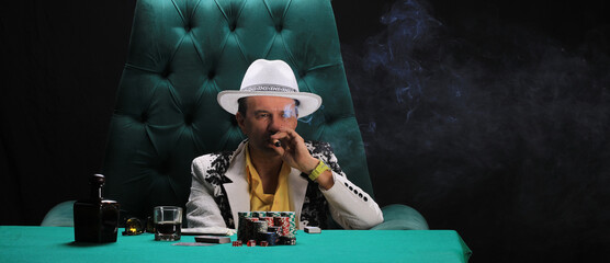 portrait of a male gambler, poker player