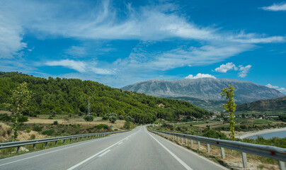 countryside road across the mountains in the countryside of the Albania. roadtrip picture