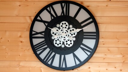 Clock with Roman Numerals and Cog Wheel Gears, Modern Time Piece Wall Art on a Pine wood Background