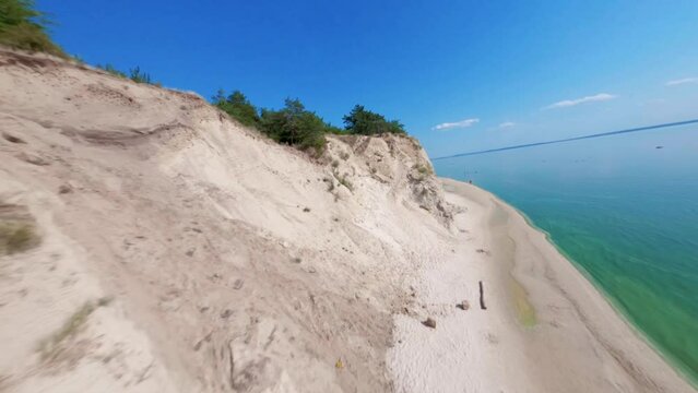 FPV, Ukraine, View from the mountain Pivikha on the Kremenchuk water reservoir near Svitlovodsk, Kirovograd region, Ukraine. Natural background in a sunny summer day.