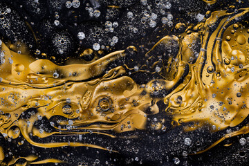 Une matière or et noir avec un mélange d'eau et d'huile