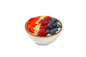 Bowl of granola with yogurt and fresh almonds, blueberries, raspberries,peach and strawberries isolated on white background. Healthy food. balanced breakfast.
