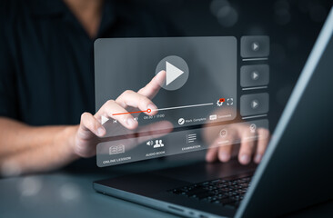 Online e-learning, self study classes, or lessons on virtual screen. Watching videos on the...