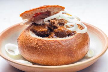 beef goulash in loaf of bread - obrazy, fototapety, plakaty