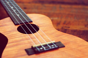 Closeup of a brown ukulele