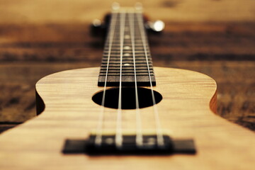 Closeup of a brown ukulele