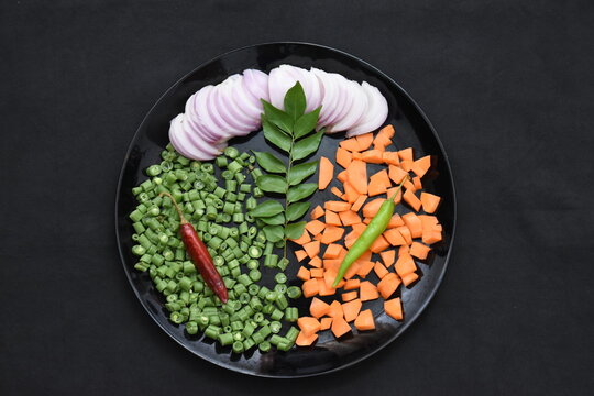 ingredients for chicken fried rice chopped cut vegetable carrot beans chilli onion