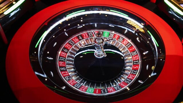 Casino roulette and slot machines waiting for gamblers and tourist to spend money