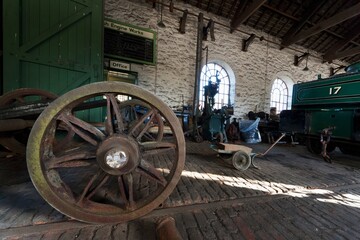 A Wheel On An Old Carriage Inside A Historical Site; Beamish, Durham, England