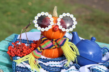 scarecrow with pumpkin