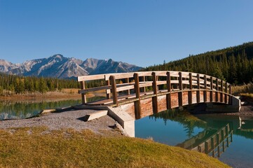 Fototapeta na wymiar Footbridge At Cascade Ponds In Banff National Park; Banff, Alberta, Canada