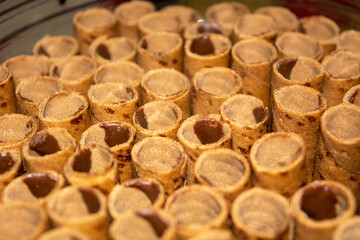 Close up flat lay of Astor Eid snacks and pastries that are still neatly arranged in jars