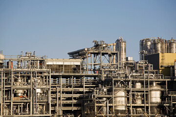 Refinery Pipes Against A Blue Sky; Fort Saskatchewan, Alberta, Canada