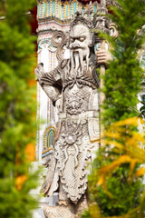 A Statue In Wat Pho, Temple Of The Reclining Buddha; Bangkok, Thailand