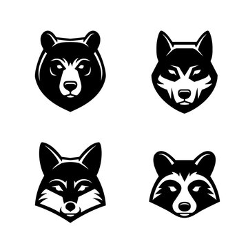 Bear, wolf, fox and raccoon face icon or logo set. Wild animals head symbols.