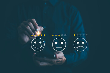 Hand Touch with Customer review satisfaction feedback survey concept, Users give a rating to service experience on the online application, service leading to reputation ranking