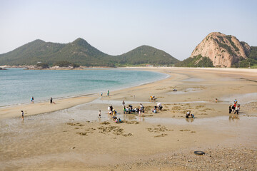 SEONYUDO, SOUTH KOREA: Seonyudo beach with beautiful curve, clean sand and families of tourists