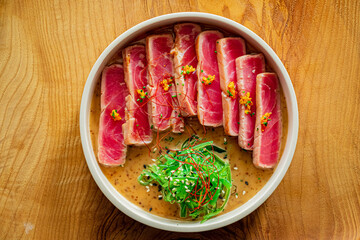 fresh tuna raw with sesame and vegetable salad