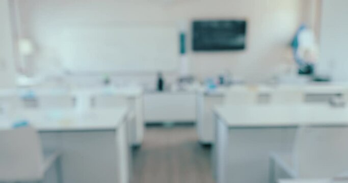 Science, classroom and blur with empty room of laboratory for learning, chemistry and technology. Medicine, education and research with interior of school for college, medical and experiment