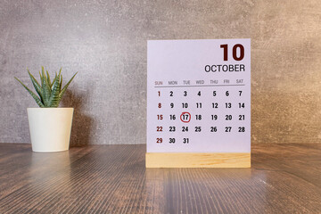 October 17th . October 17 white wooden calendar on white background. Autumn day. Copy space for...