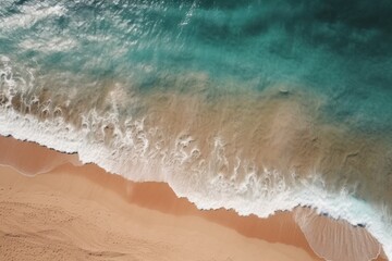 Fototapeta na wymiar Aerial view of sandy beach and waves. Turquoise water, summer landscape