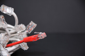Network internet cable isolated on black background