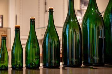 Different size of champagne bottles, traditional making champagne sparkling wine from chardonnay and pinor noir grapes, Epernay, Champagne, France