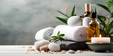 Photo sur Plexiglas Spa beauty treatment items for spa procedures on white wooden table. massage stones, essential oils and sea salt. copy space