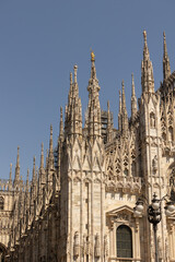 Fototapeta premium Details of front facade of Milan Cathedral.