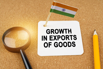 On the table is the flag of India and a sheet of paper with the inscription - growth in exports of...